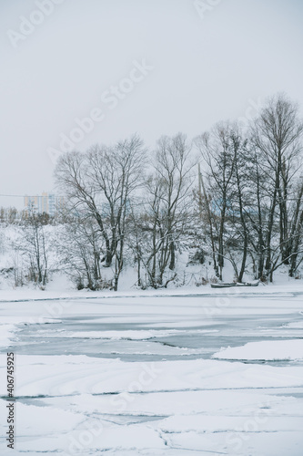 Winter frosty landscape of the river with broken ice © ShevarevAlex
