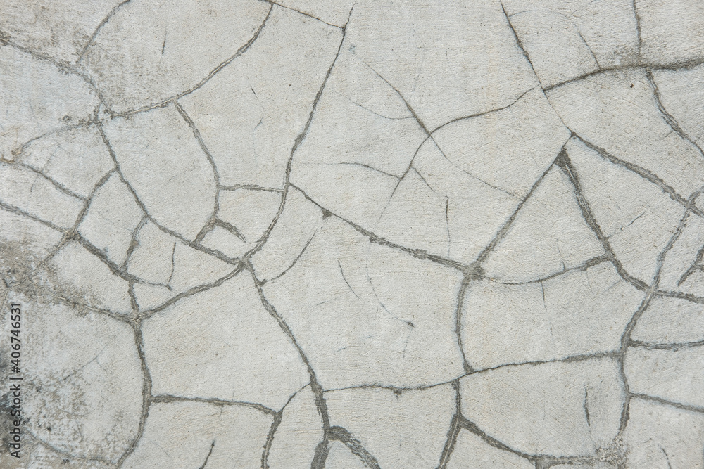 Obraz premium Texture of a gray wall with peeling plaster. Textured wall for background.