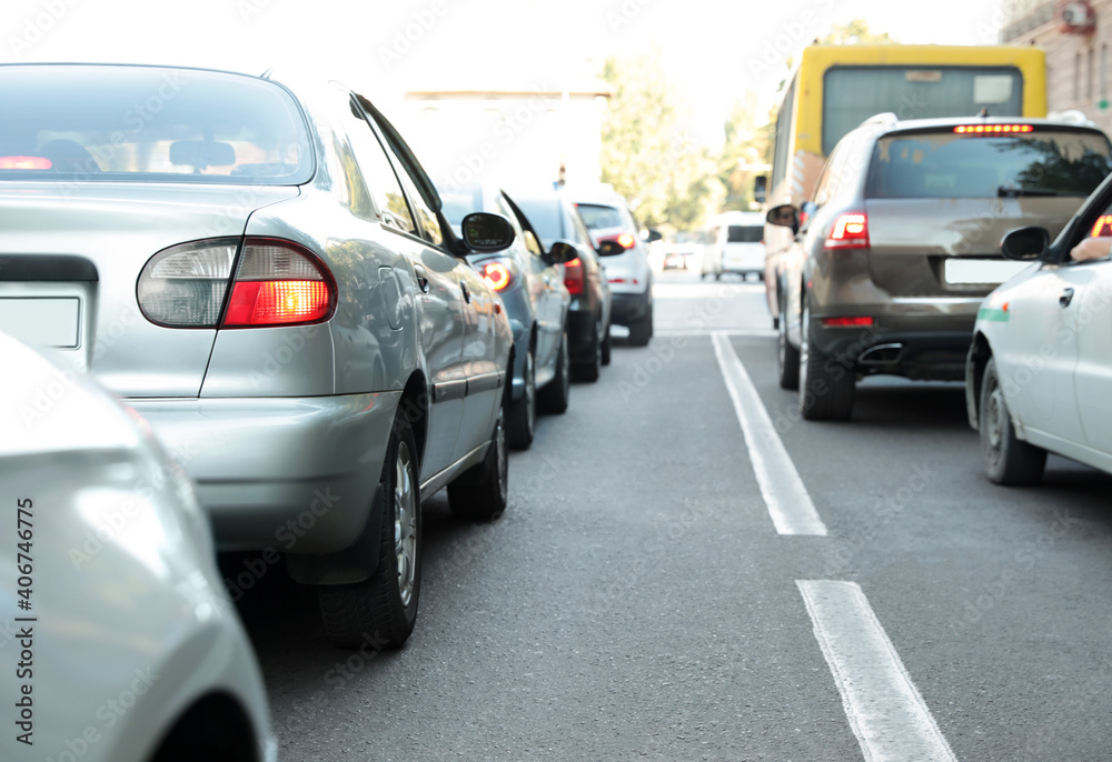 Cars in traffic jam on city street