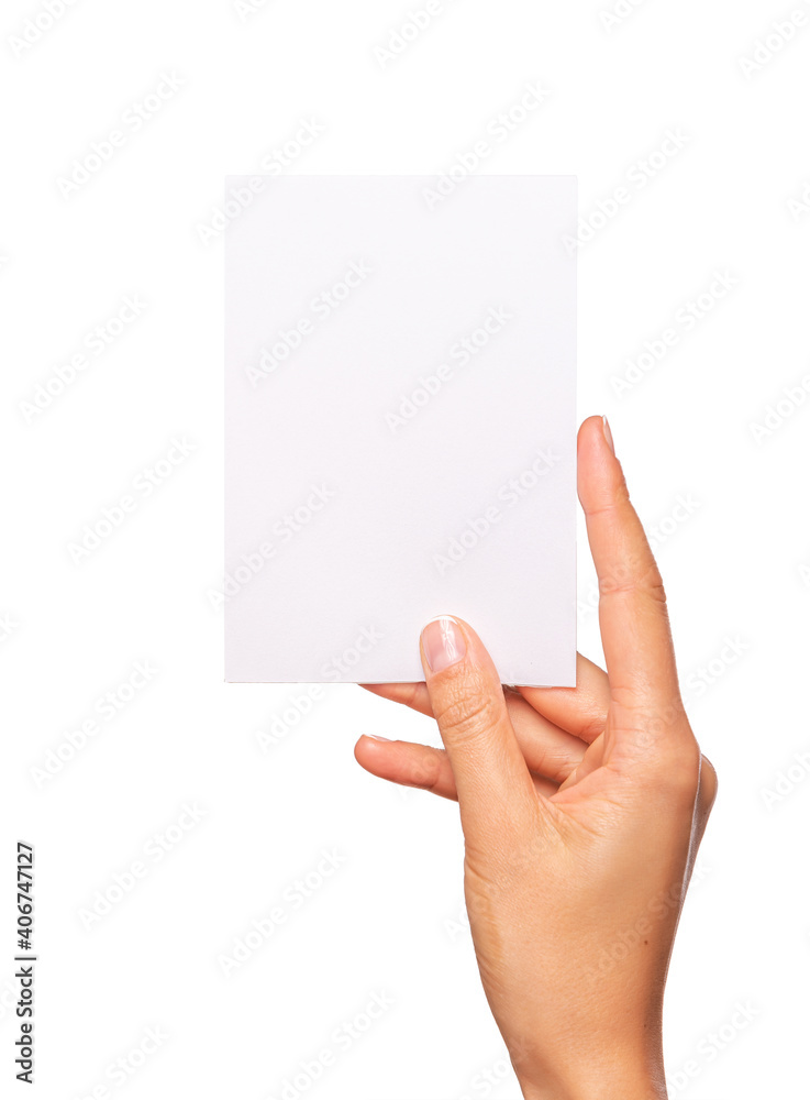 Female hand holds a white card isolated on a white background. Female hand holds a white card isolated on a white background.
