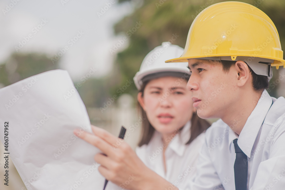 Two people engineer use blueprint talking discussion building civil construction project Two people engineer use blueprint talking discussion building civil construction project