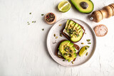 Avocado sandwiches with cheese, avocado on toasted bread. banner, catering menu recipe place for text, top view