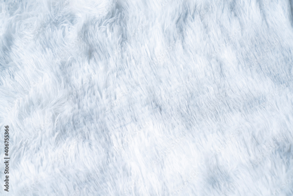 Close up white shaggy artificial fur texture or carpet for background. Close up white shaggy artificial fur texture or carpet for background.