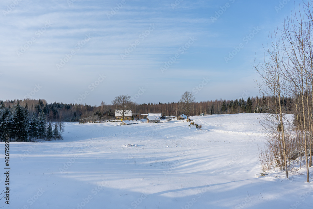 in winter a lonely old country house located in a valley surrounded by forest and has snow in winter a lonely old country house located in a valley surrounded by forest and has snow