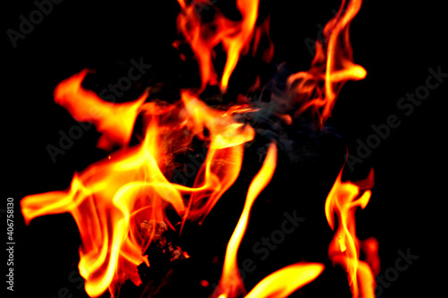 Close up of fire and flames on a black background. 
