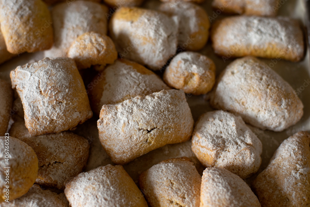 Homemade cookies as a background, typical italian pastry product. Carnival cookies. Nobody.

