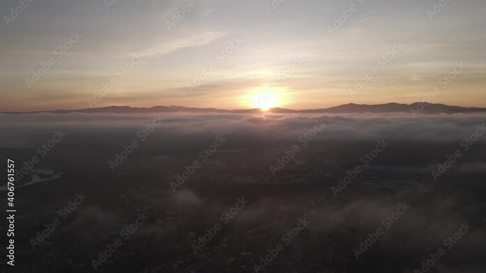 Aerial View of Scenic Sunset Above Clouds and San Miguel de Allende City, Mexico Aerial View of Scenic Sunset Above Clouds and San Miguel de Allende City, Mexico