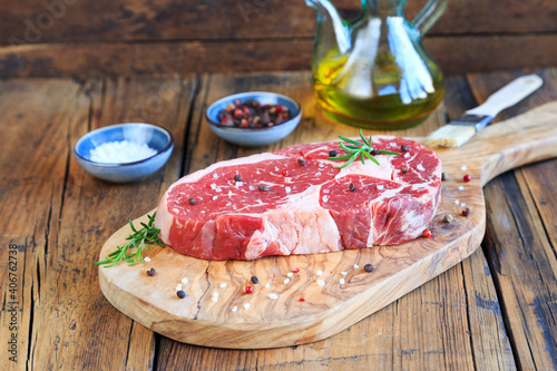 raw rib eye steak photo