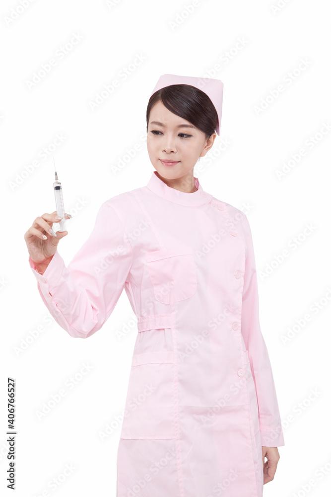 Portrait of young female nurses holding injector Portrait of young female nurses holding injector
