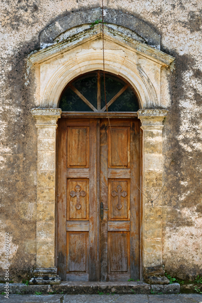 Old weathered closed wooden door