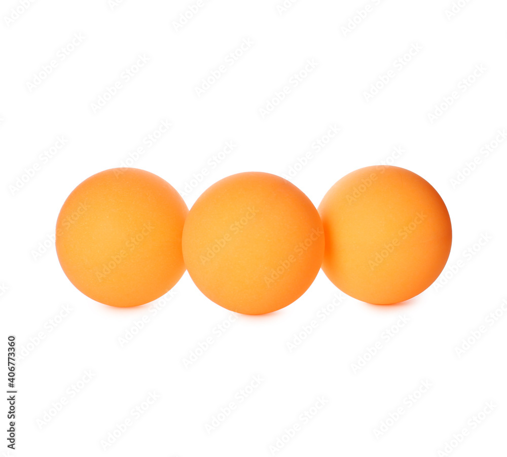 Orange plastic balls for table tennis on white background