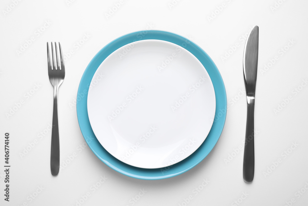 Stylish table setting on white background, top view Stylish table setting on white background, top view