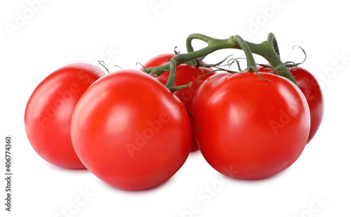 Branch of fresh cherry tomatoes isolated on white