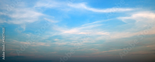 Blue sky with beautiful white clouds. Wide photo. © alinamd
