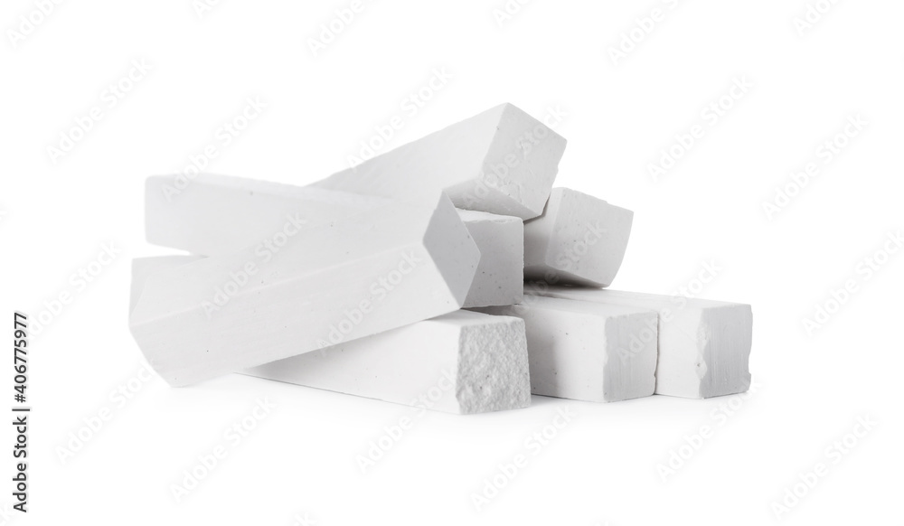 Small pieces of chalk on white background Small pieces of chalk on white background