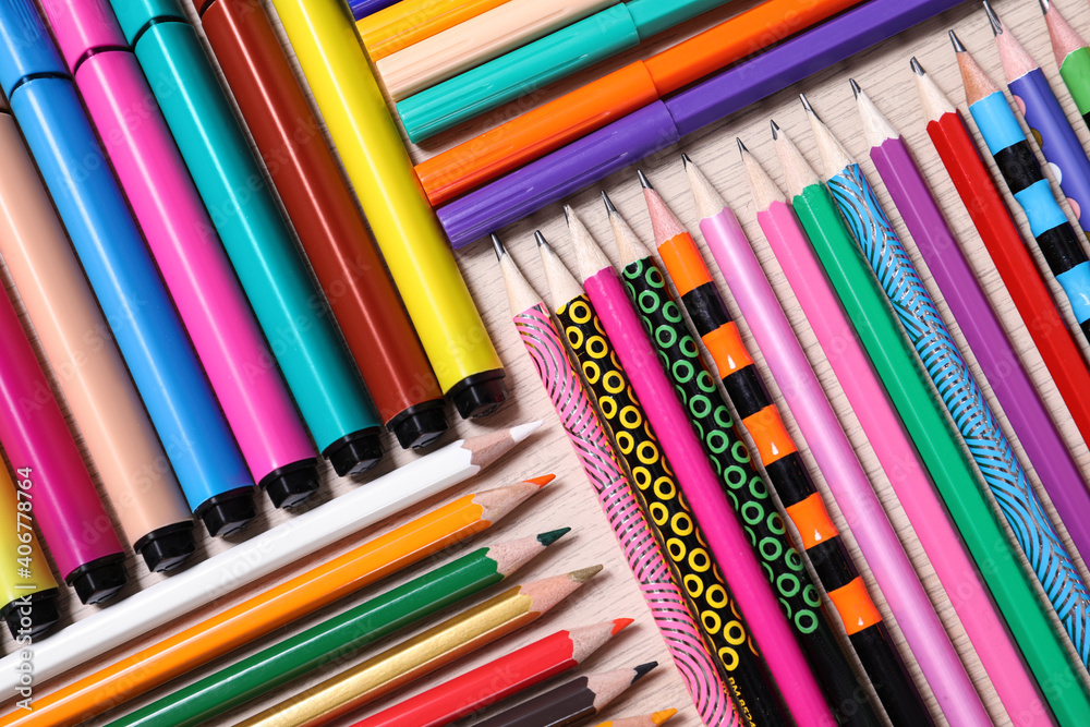 Different school stationery on wooden table, flat lay Different school stationery on wooden table, flat lay