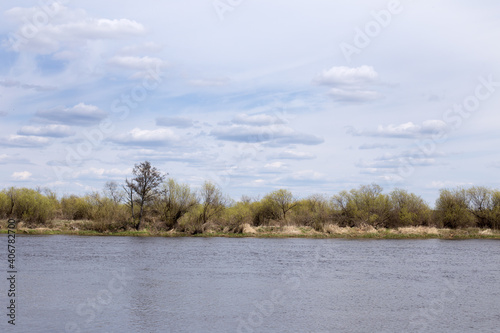 River and clouds floating in the calm sky