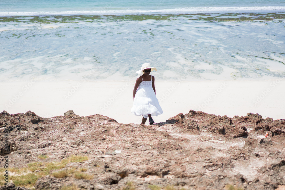Beautiful African American girl on sea beach Beautiful African American girl on sea beach