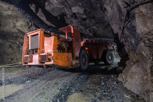 Underground gold ore mine shaft tunnel gallery passage with load  haul  dump machine LHD Toro