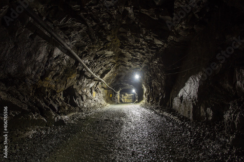 Underground gold mine shaft tunnel drift with light