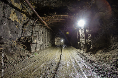 Underground gold mine shaft tunnel drift with light