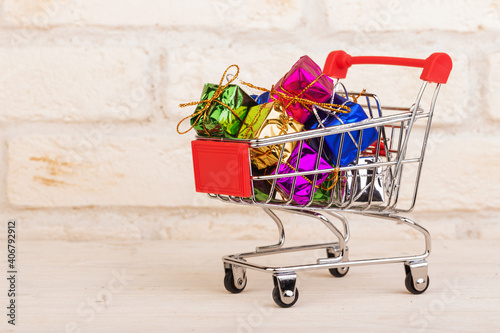 Gift boxes in a shopping trolley