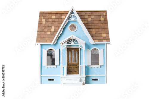 Fotografiet Realistic looking wooden dollhouse isolated on white with clipping path