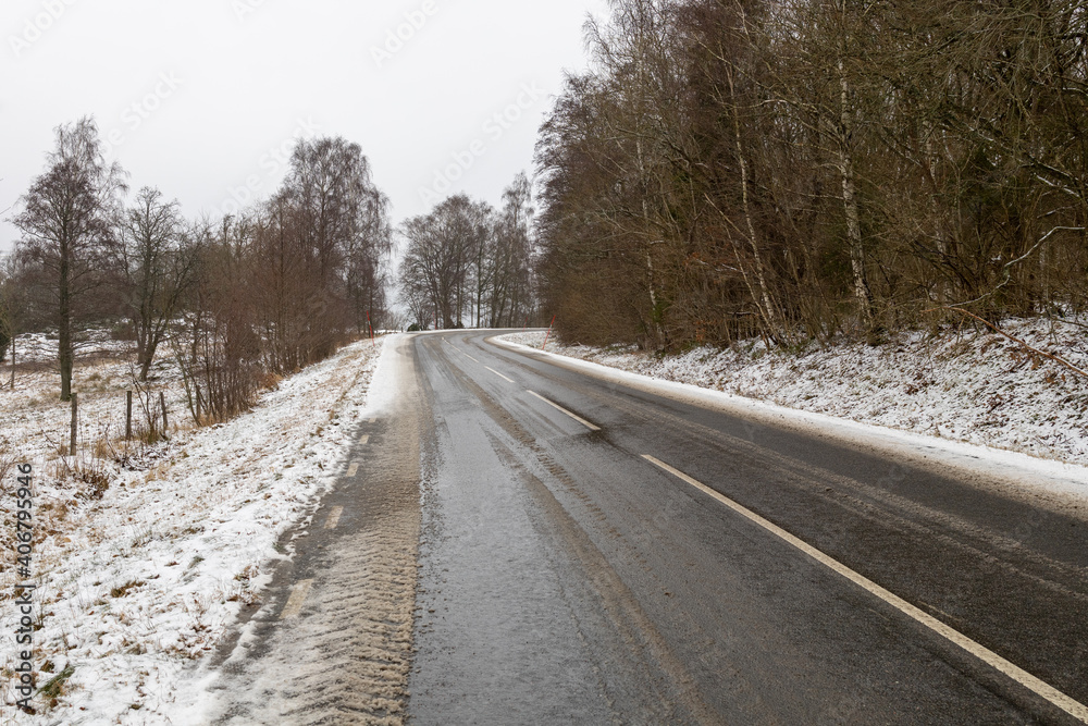 Country road in a frozen rural landscape