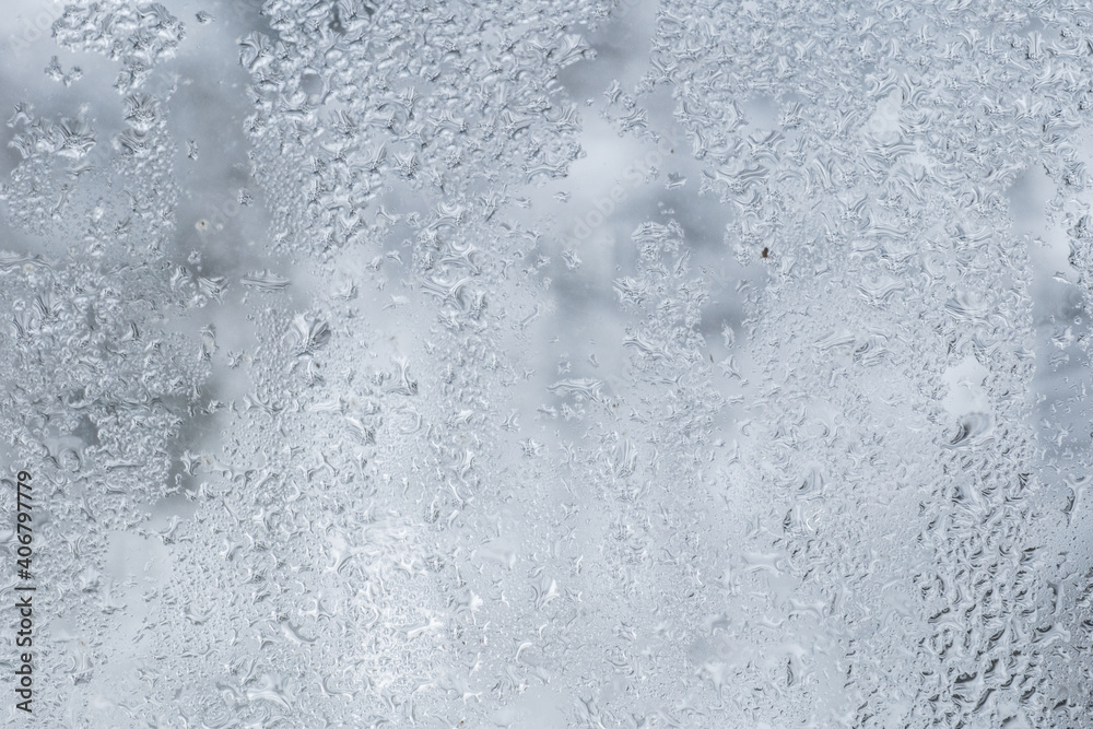 water drops on glass in winter water drops on glass in winter