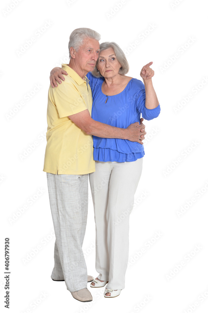 portrait of senior couple pointing something portrait of senior couple pointing something