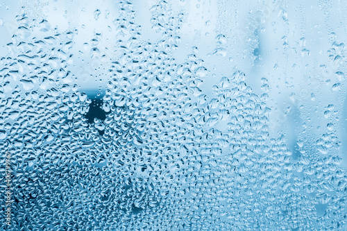 water drops on glass in winter