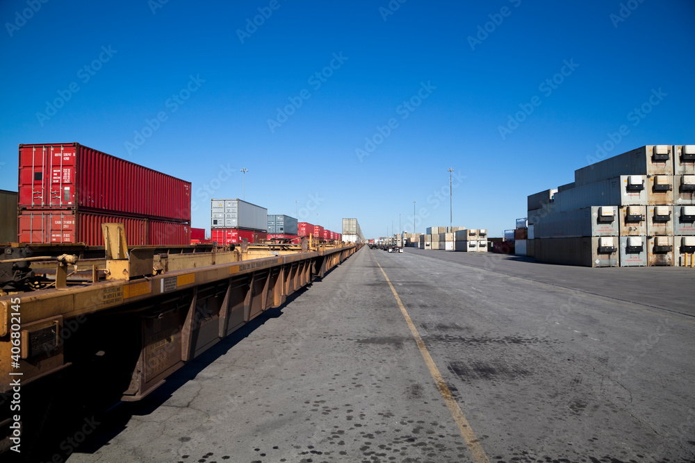 Rail yard with containers loaded onto train