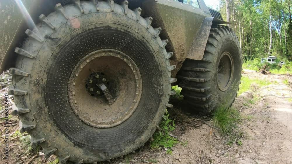All-terrain vehicle on a forest road. Off-road transport All-terrain vehicle on a forest road. Off-road transport