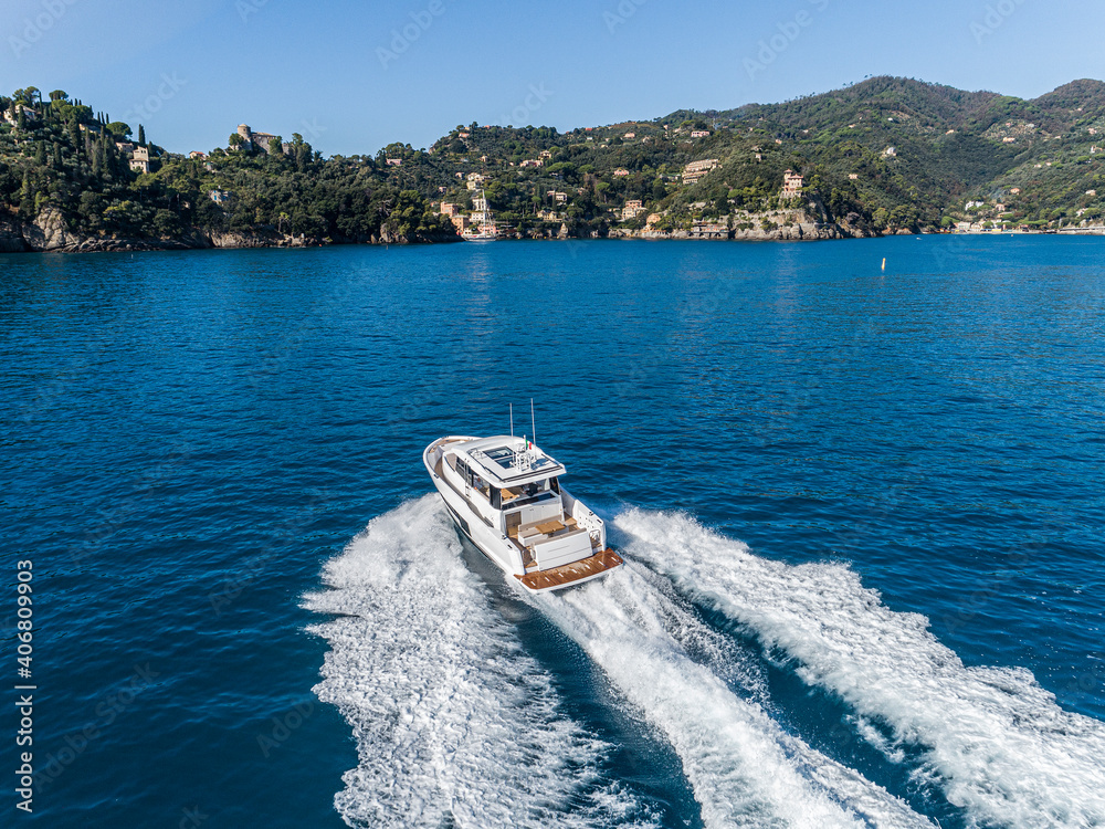 Naklejka premium motor yacht in navigation aerial view