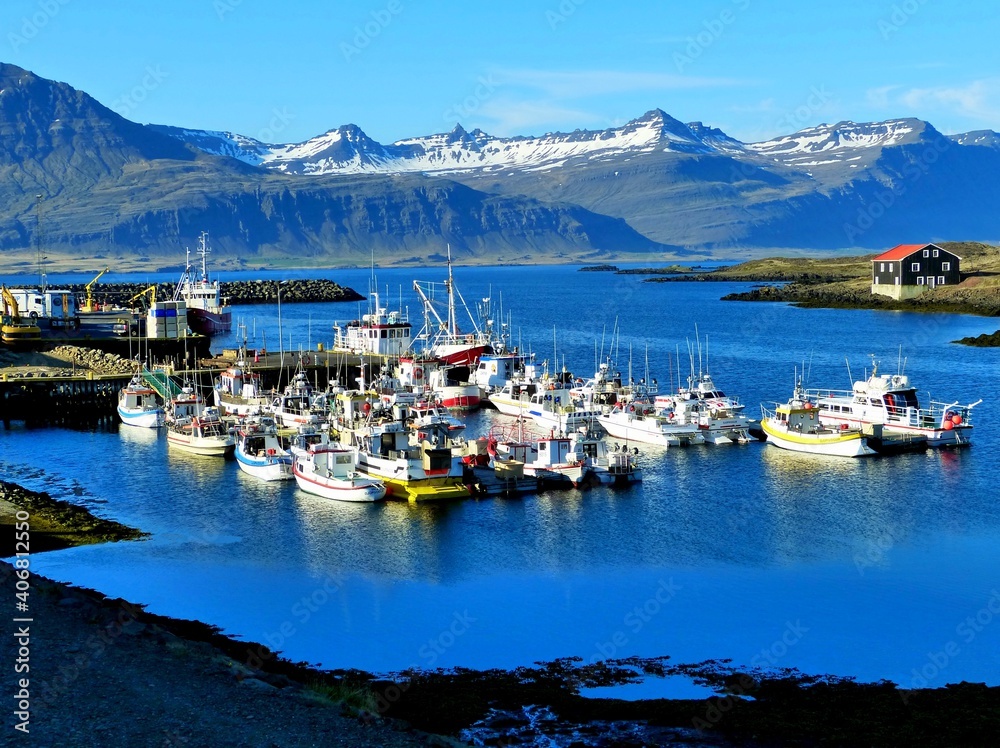 Obraz premium Iceland Djupivogur cruise port, Boats, ships, nautical vessel in harbor. Icelandic fishing village located in stunning surroundings East Fjords. Peaceful landscape, idyllic northern nature.