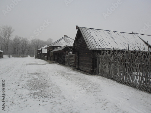 An ancient village, snow fell.