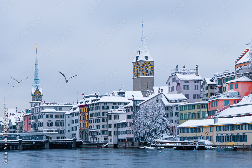 Cityscape of Zurich (Switzerland), River Limmat, Fraumunster Church and St Peter Church