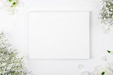Canvas mockup with smal white flowers on a white background. Design element for Valentines Day and Mother Day congratulation, thank you, greeting or invitation card, art work