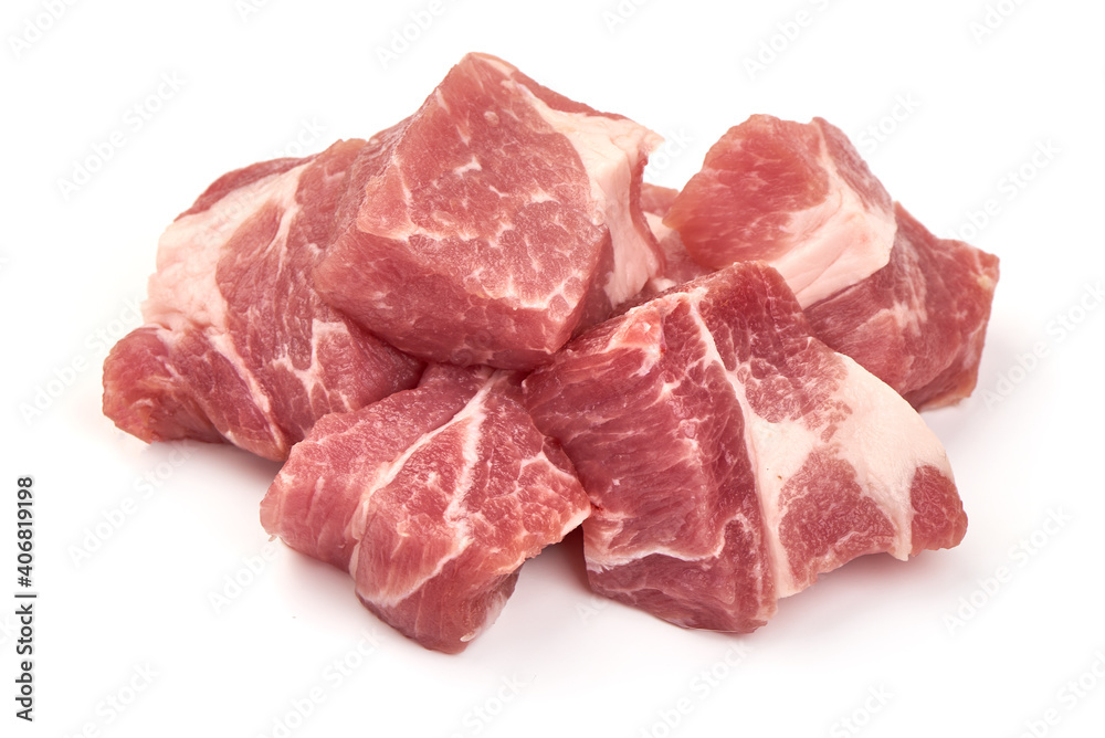 Raw pork pieces, isolated on white background