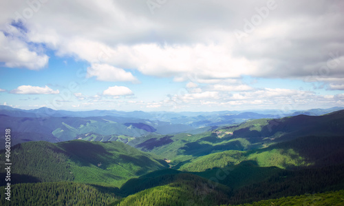 View of green mountain plains and mountains