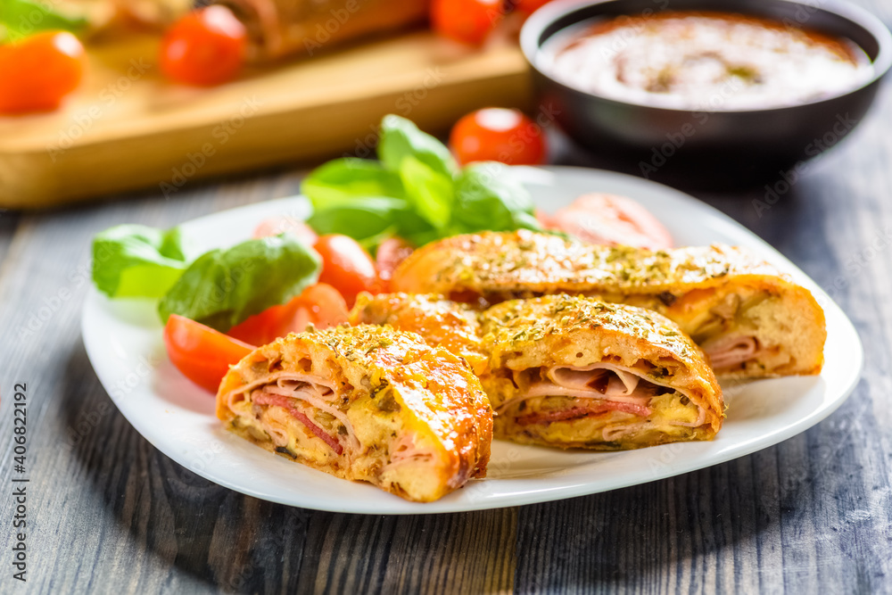 Pizza stromboli - an Italian delicacy from the USA Pizza stromboli - an Italian delicacy from the USA