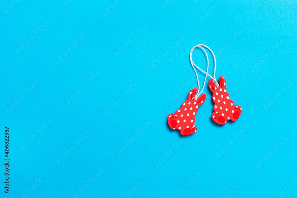 Easter bunny decoration on blue paper background