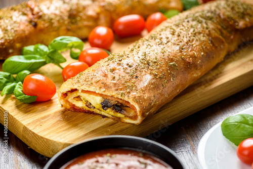 Pizza stromboli - an Italian delicacy from the USA photo