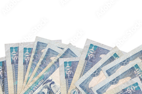 50 Nepalese rupees bills lies on bottom side of screen isolated on white background with copy space. Background banner template photo