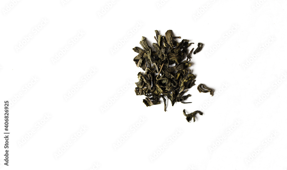 Black tea leaves on white isolated background.Black dry tea leaves. Black tea leaves on white isolated background.Black dry tea leaves.