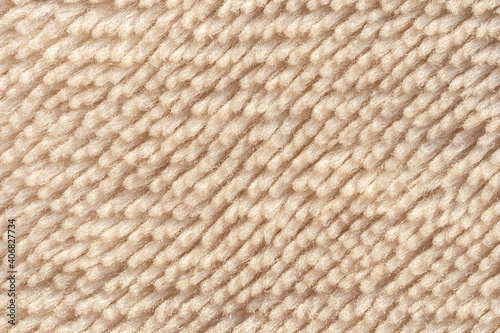 Top view cream color Fur blanket. Fluffy fake textile fur.