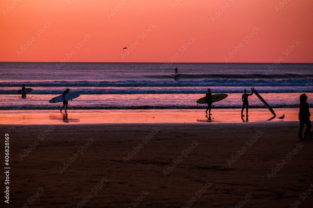 Surfers at Sunset