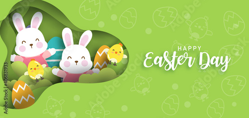 Easter day card with  cute rabbiits and easter eggs.