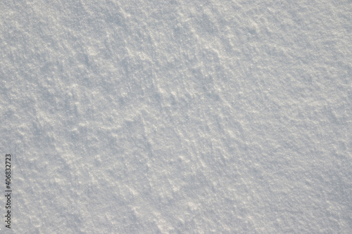 Smooth surface of white snow in frost.