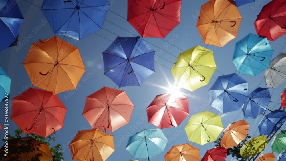 Collection of colorful umbrellas on sky background Collection of colorful umbrellas on sky background